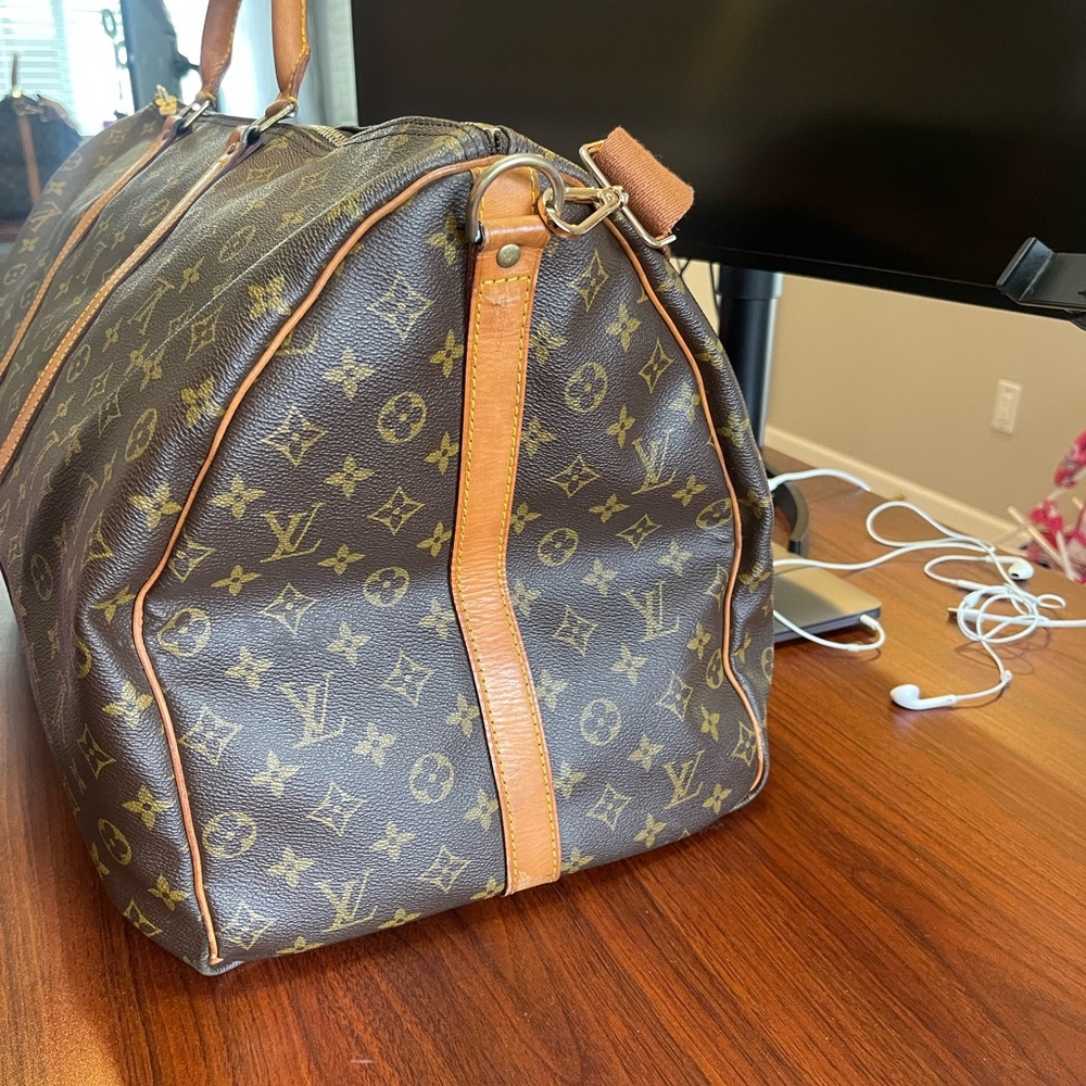 100% Authentic- Louis Vuitton Keepall 60 = 23.6 in x 12.99 in x 10.2 in